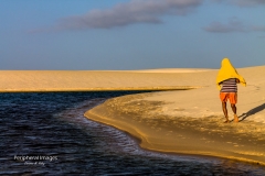 Man Walking Along Sand Dunes- Lencois Maranhenses Brazil